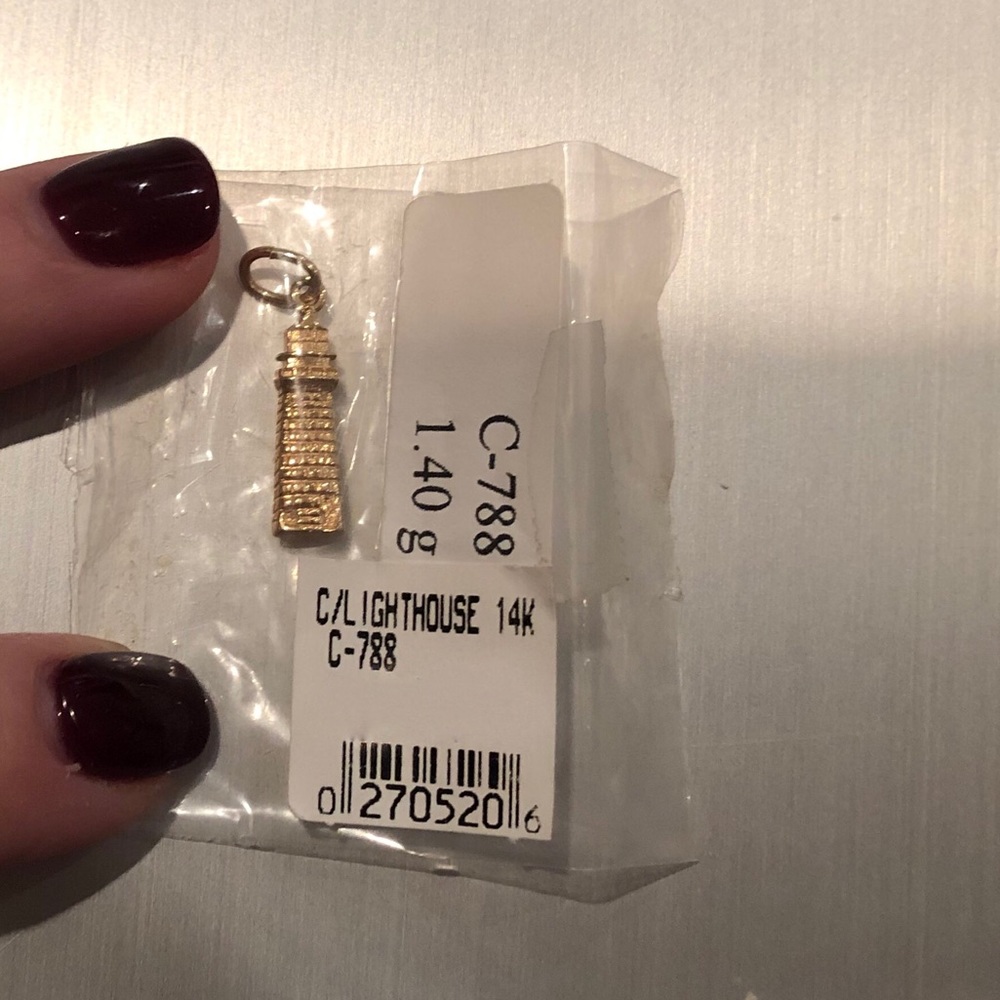 Solid 14K gold necklace/bracelet lighthouse charm.